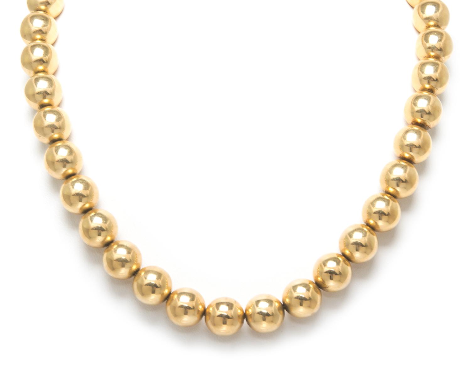 A 14 Karat Yellow Gold Bead Necklace, 26.10 dwts.