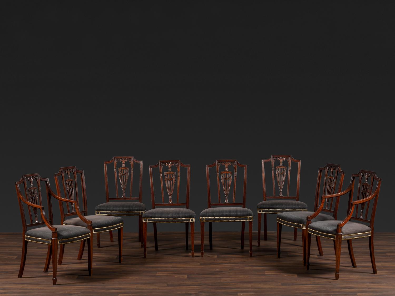 A Set of Eight Federal Carved Mahogany Dining Chairs