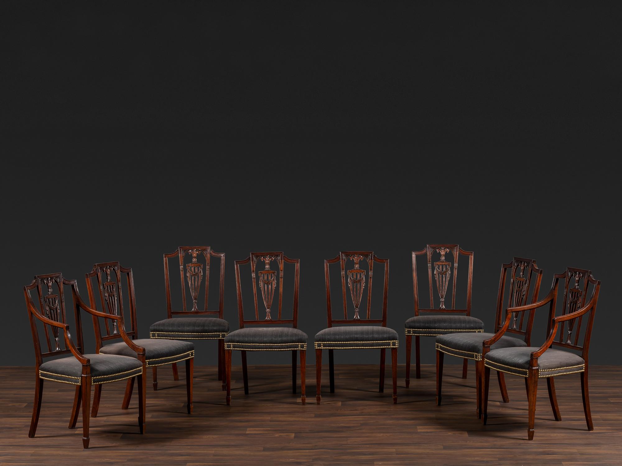 A Set of Eight Federal Carved Mahogany Dining Chairs