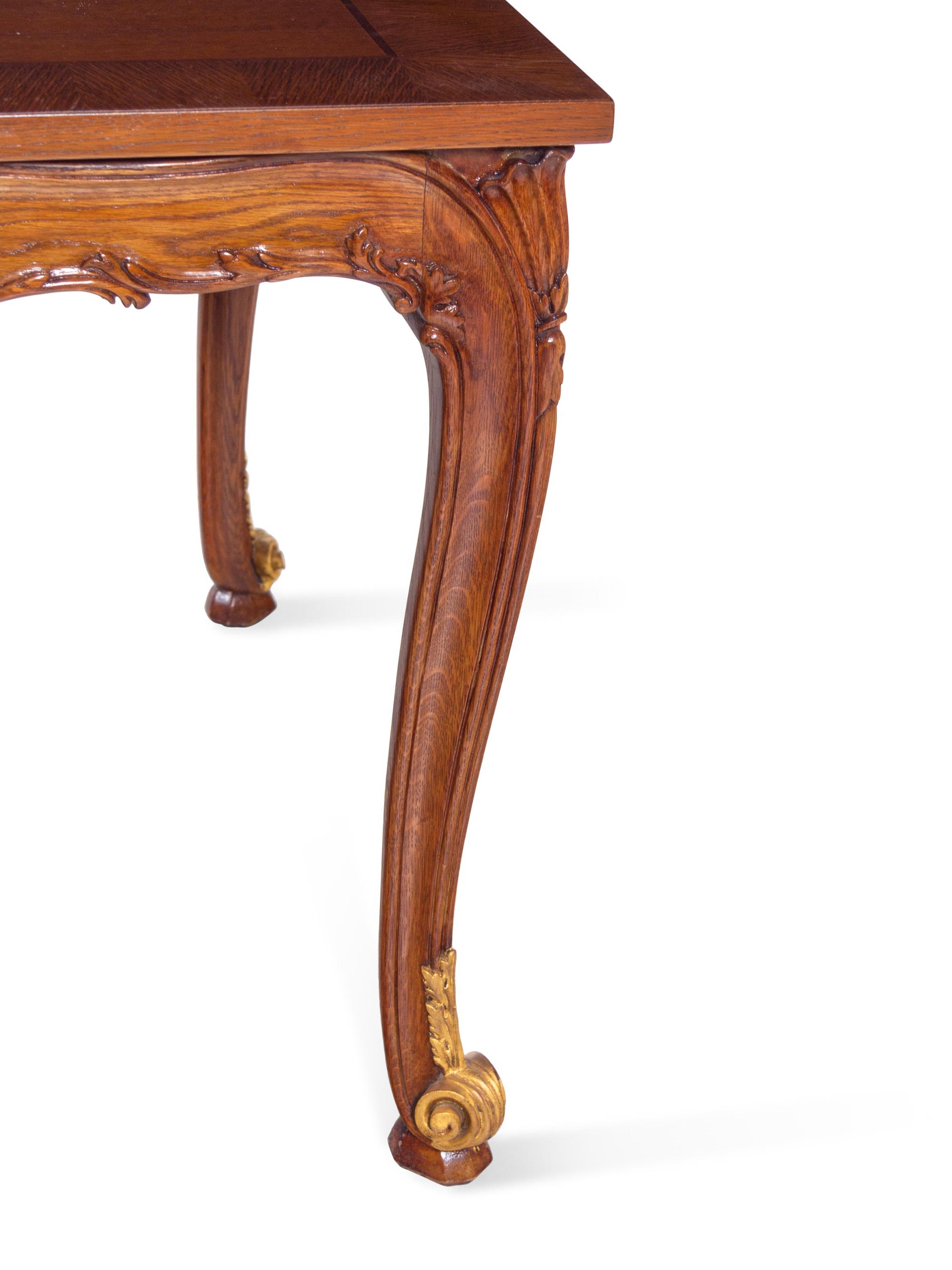 A Louis XV Style Parcel Gilt Walnut Center Table