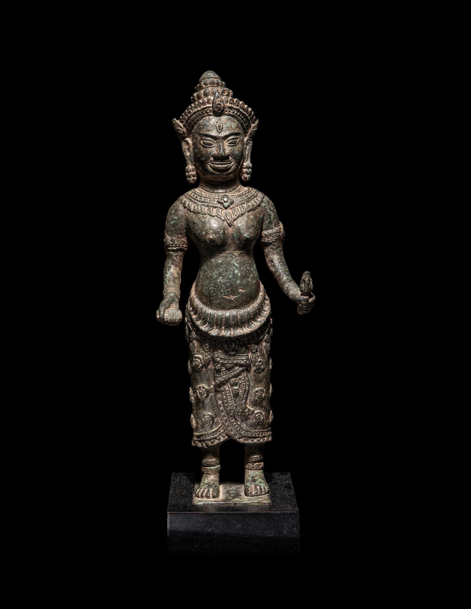 A Khmer Bronze Figure of a Deity