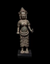 A Khmer Bronze Figure of a Deity