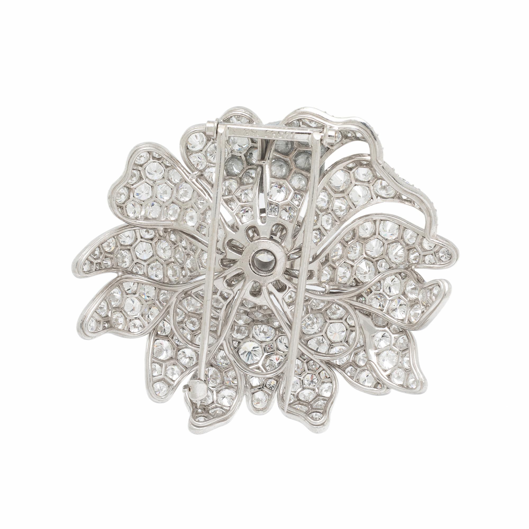 VAN CLEEF & ARPELS, DIAMOND AND PLATINUM FLOWER BROOCH
