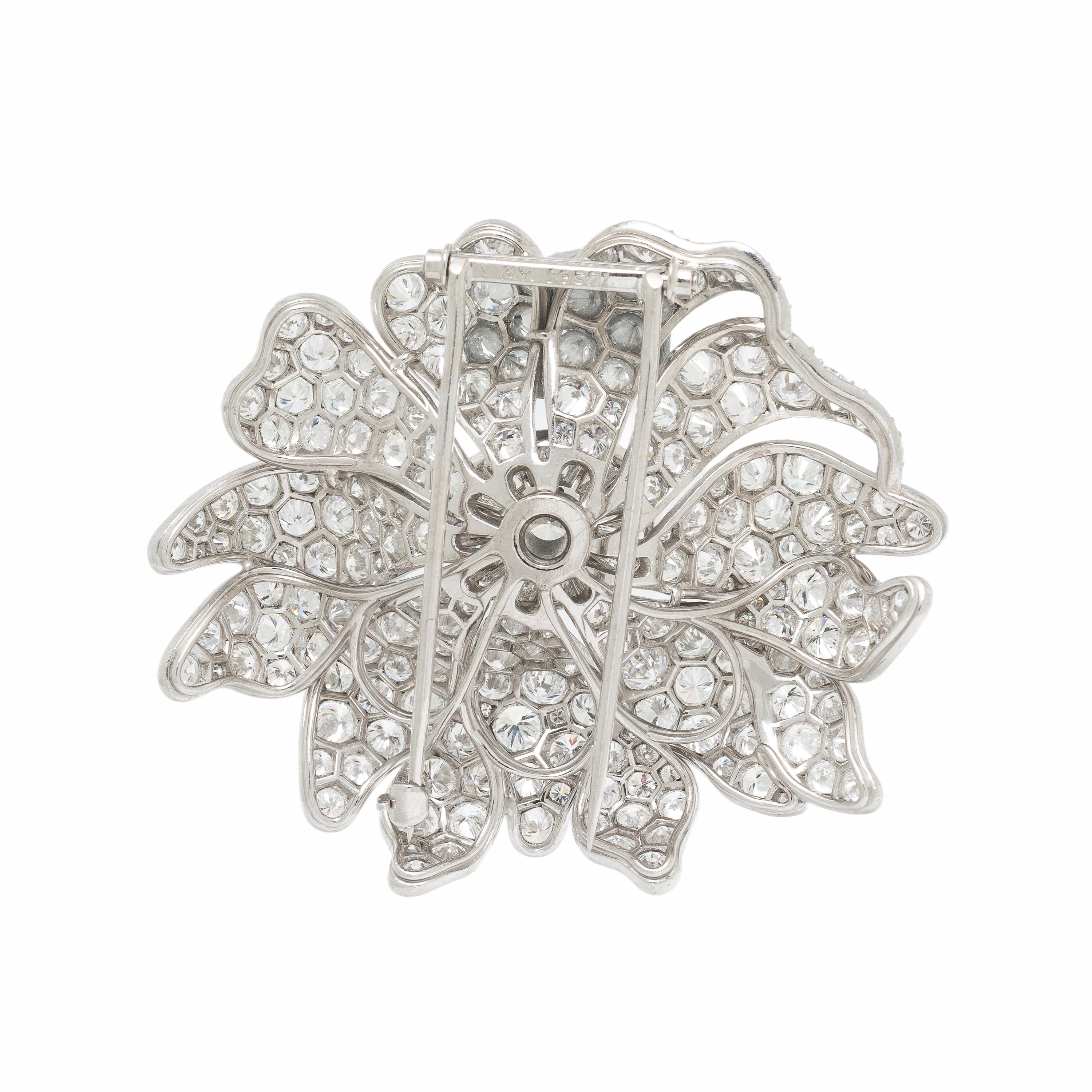VAN CLEEF & ARPELS, DIAMOND AND PLATINUM FLOWER BROOCH
