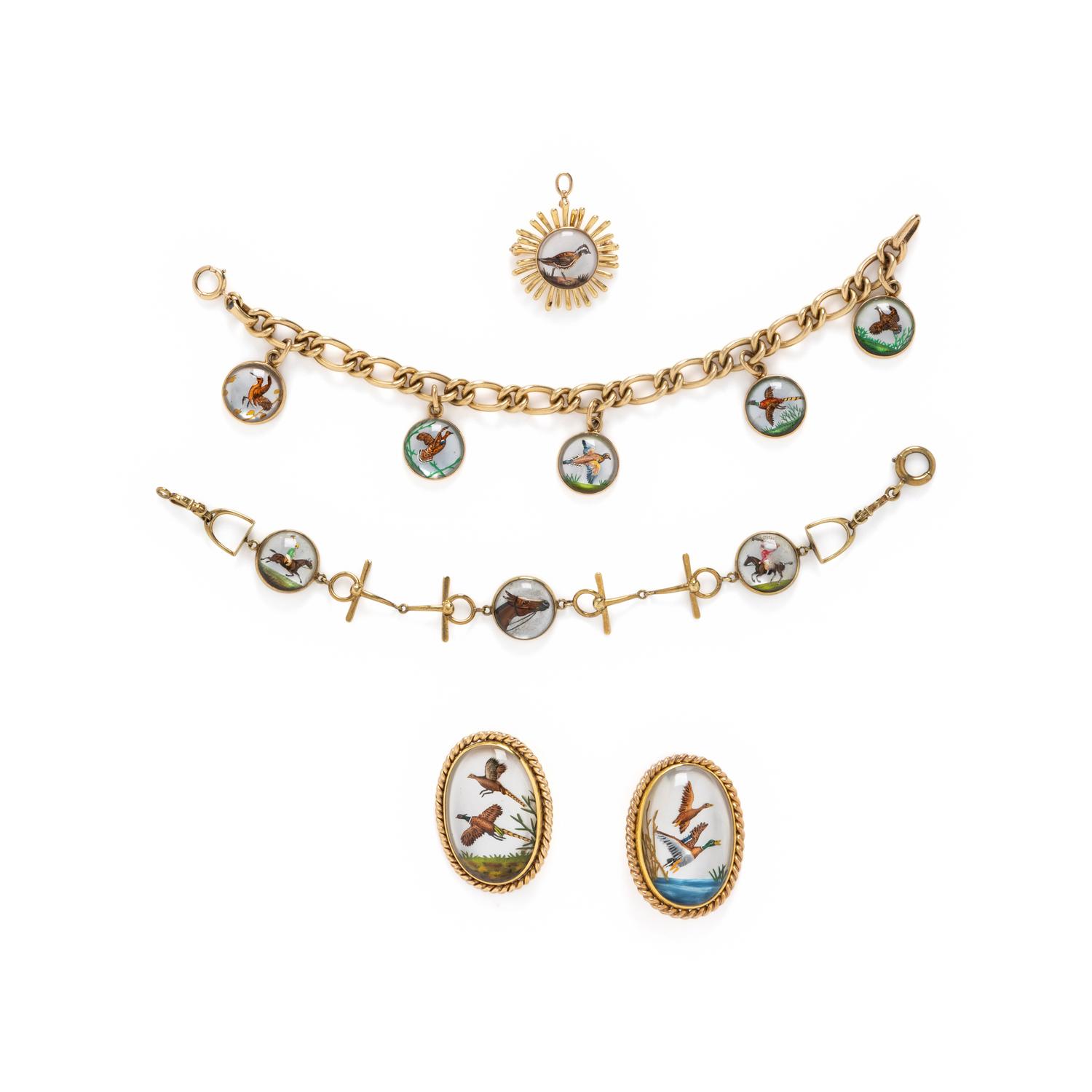 COLLECTION OF REVERSE PAINTED CRYSTAL JEWELRY