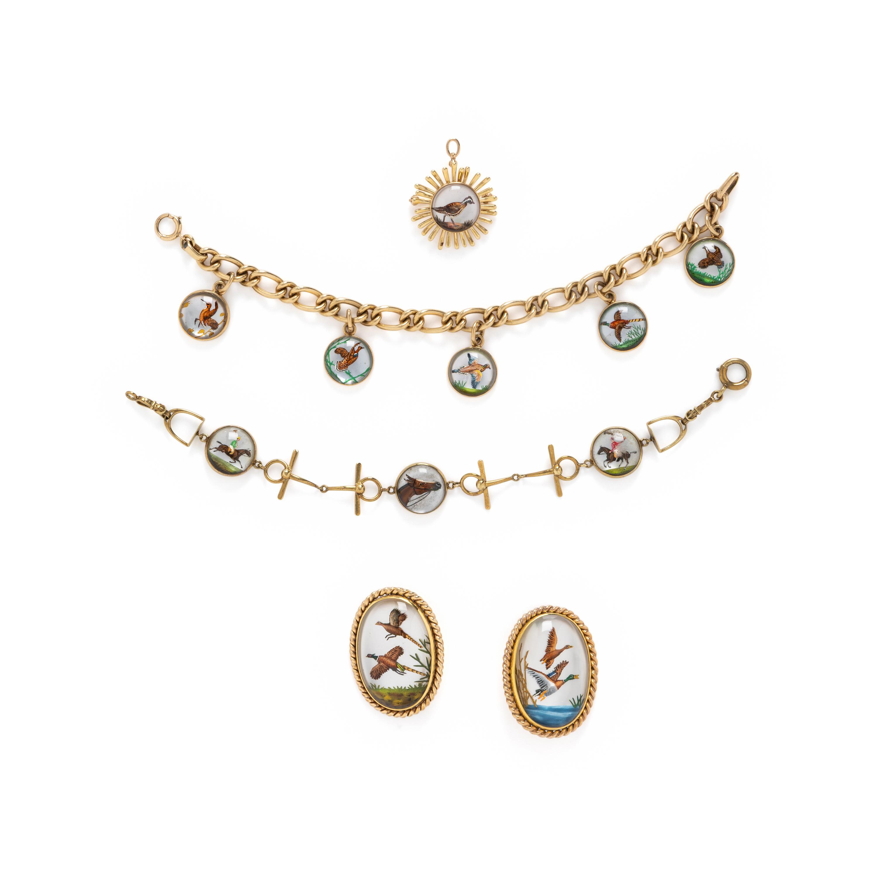 COLLECTION OF REVERSE PAINTED CRYSTAL JEWELRY