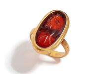 A Roman Carnelian Ring Stone with the Queen Omphale Dressed as Hercules — Set in a gold ring