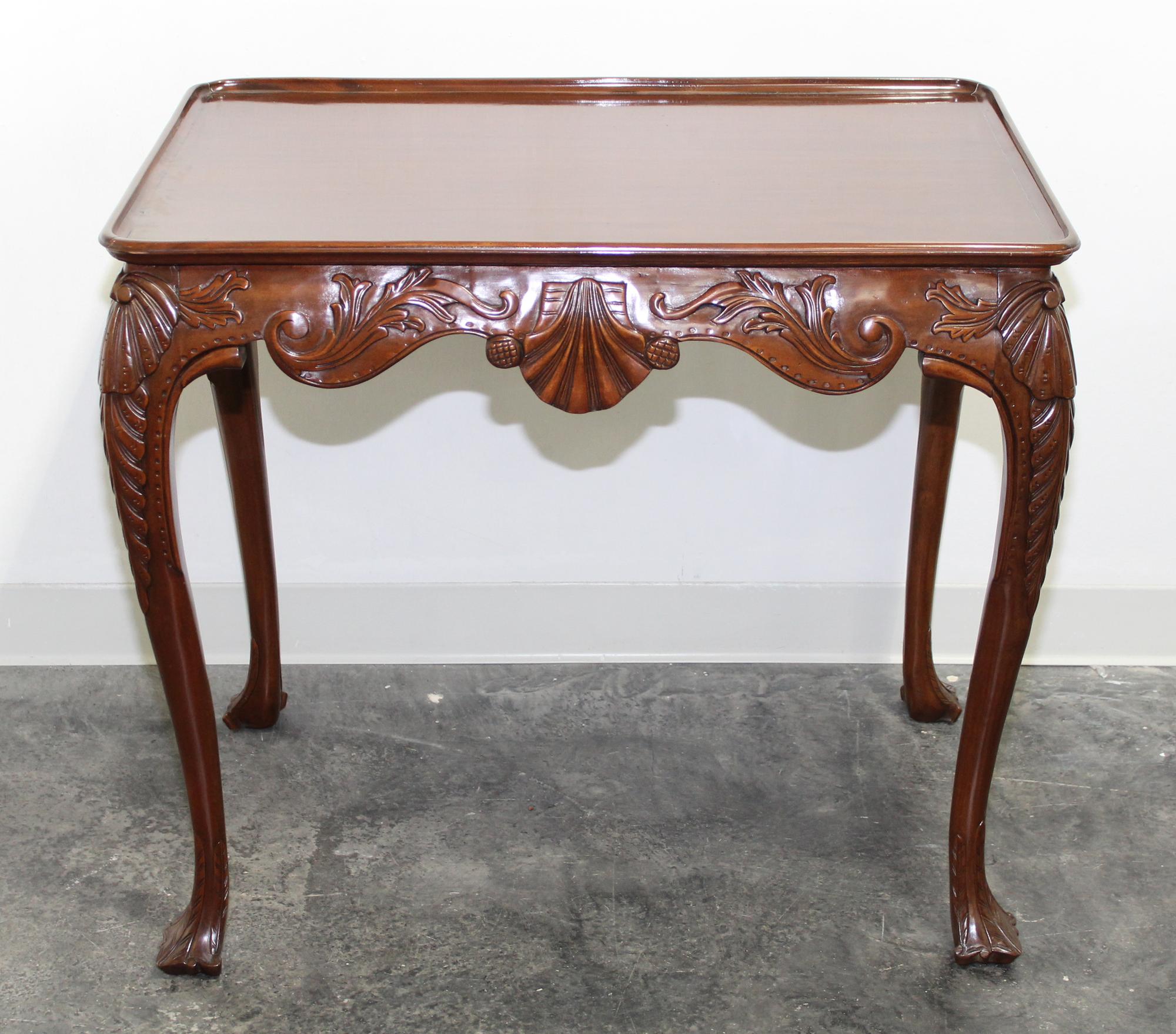 A Georgian Style Mahogany Tea Table Height 29 x width 32 1/2 x depth 21 3/4 inches.