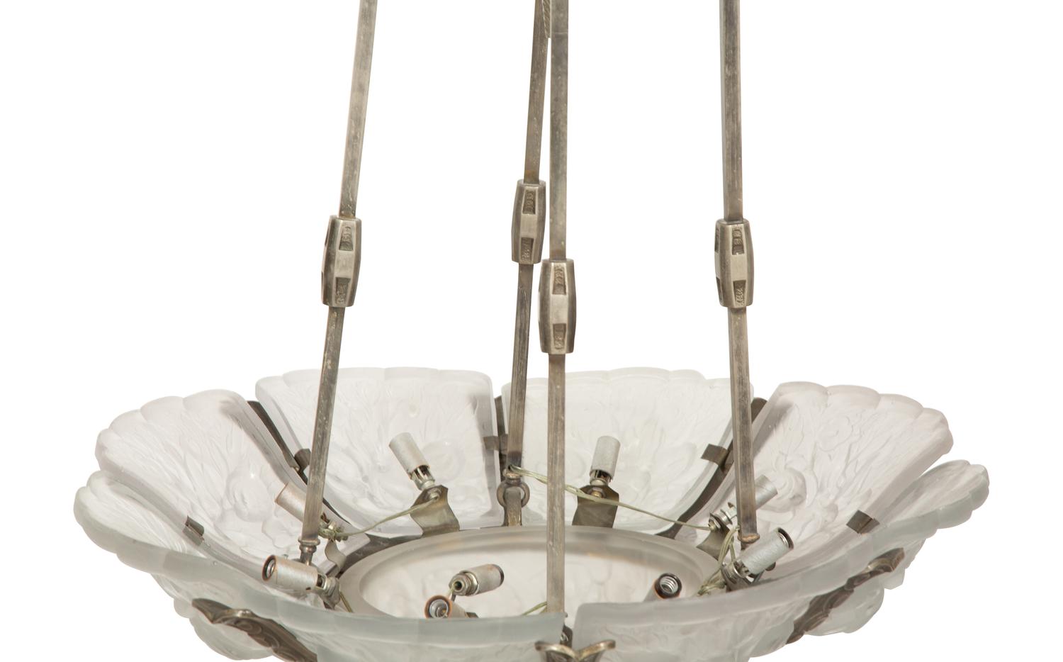 A French Art Deco Molded and Frosted Glass Eight-Light Chandelier in the manner of Hettier & Vincent