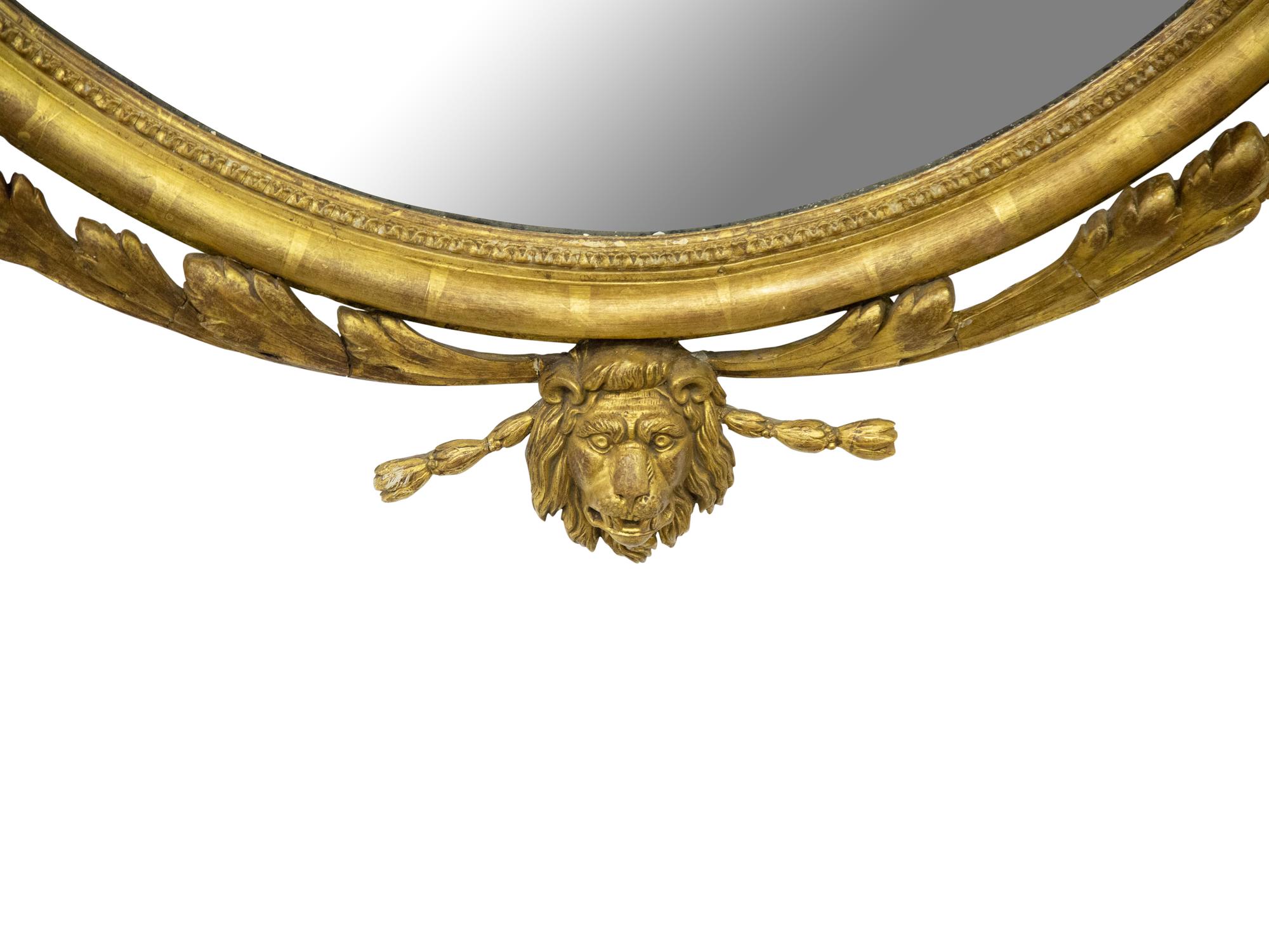A Pair of George II Style Oval Giltwood Mirrors