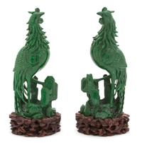 A Pair of Chinese Carved Green Hardstone Models of Phoenix Birds — 19TH CENTURY