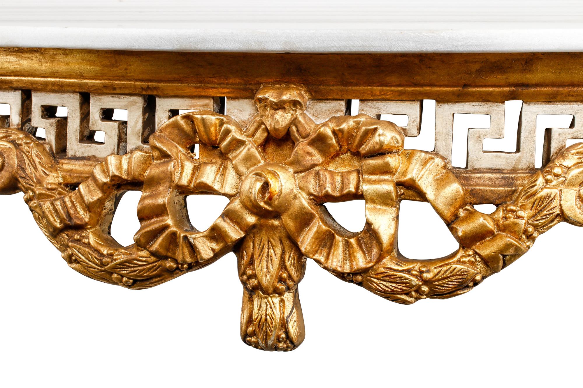 A Pair of Italian Neoclassical Style Painted and Parcel Gilt Marble-Top Console Tables