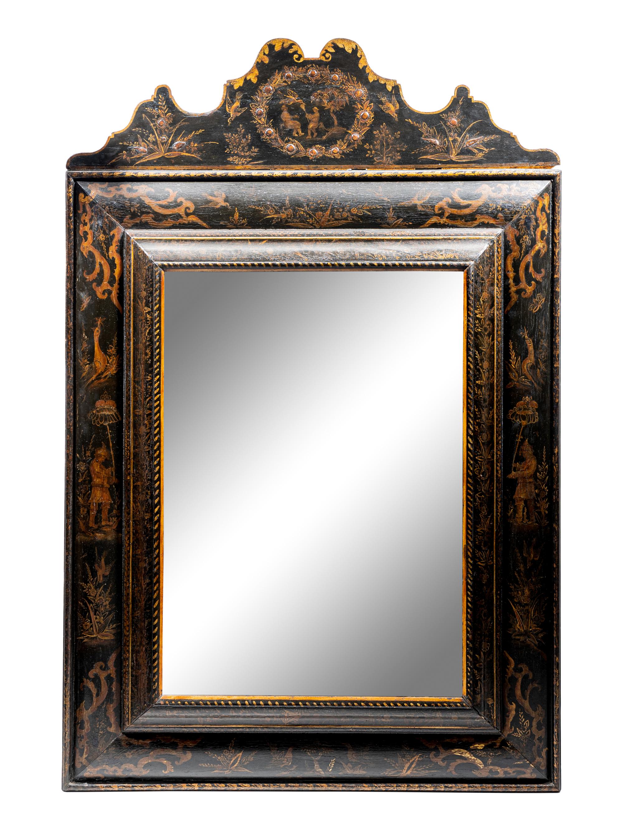 A North Italian Black Japanned Cushion Mirror