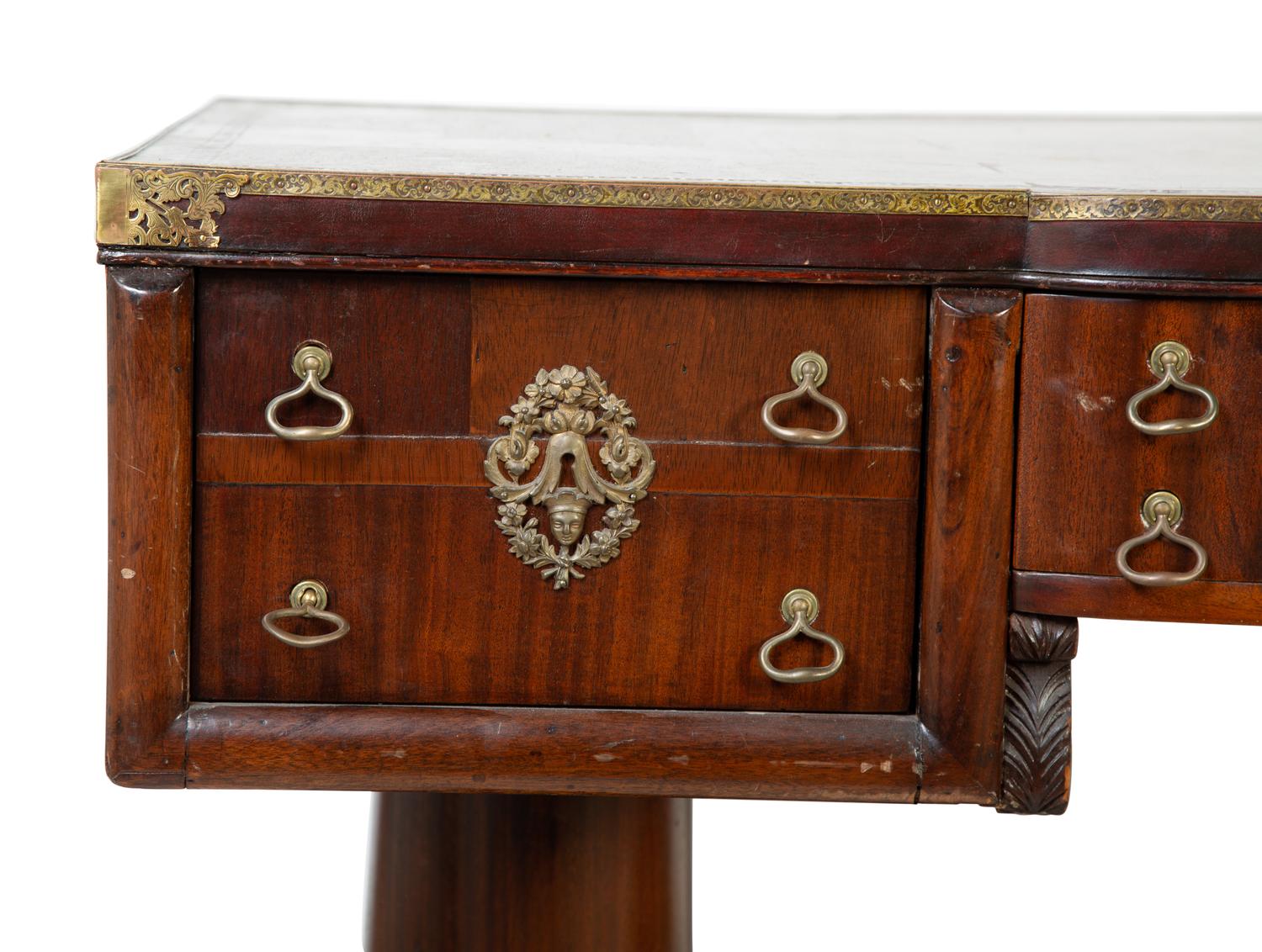 A Late Regency Style Mahogany Partner's Desk — 19TH CENTURY