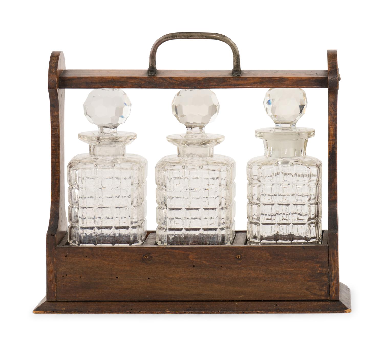 An English Oak and Cut Glass Tantalus