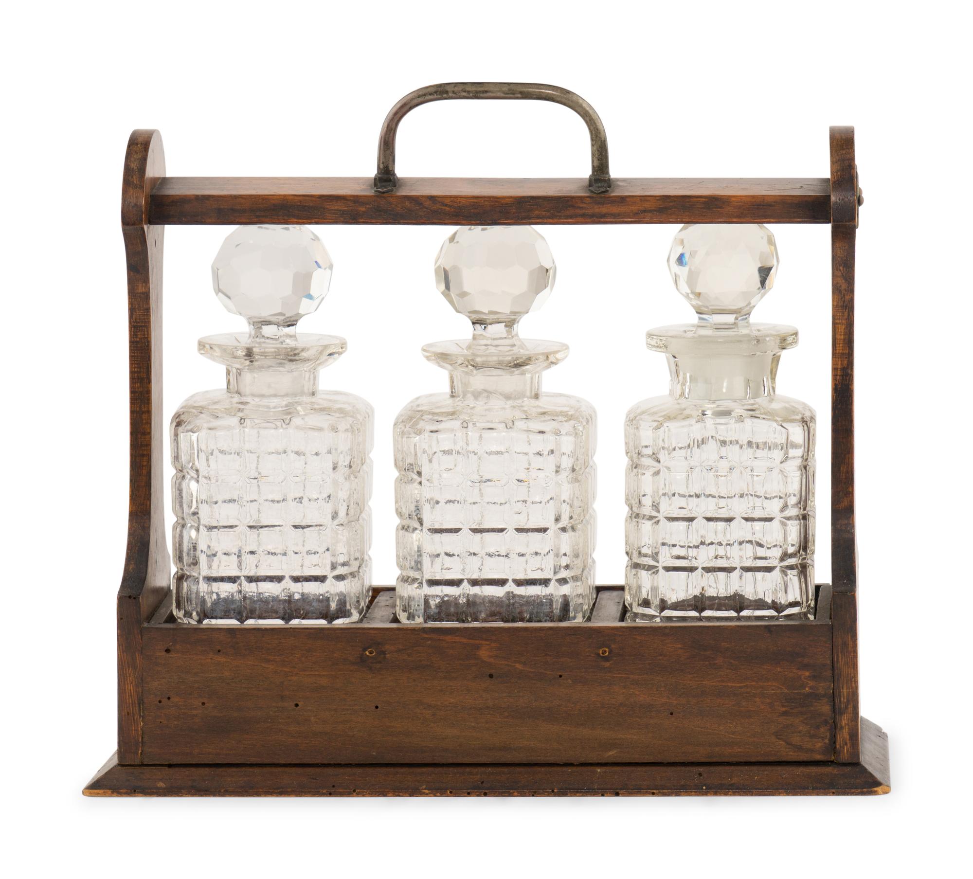 An English Oak and Cut Glass Tantalus