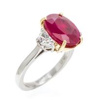 A Platinum, Yellow Gold, Ruby and Diamond Ring, 4.70 dwts.