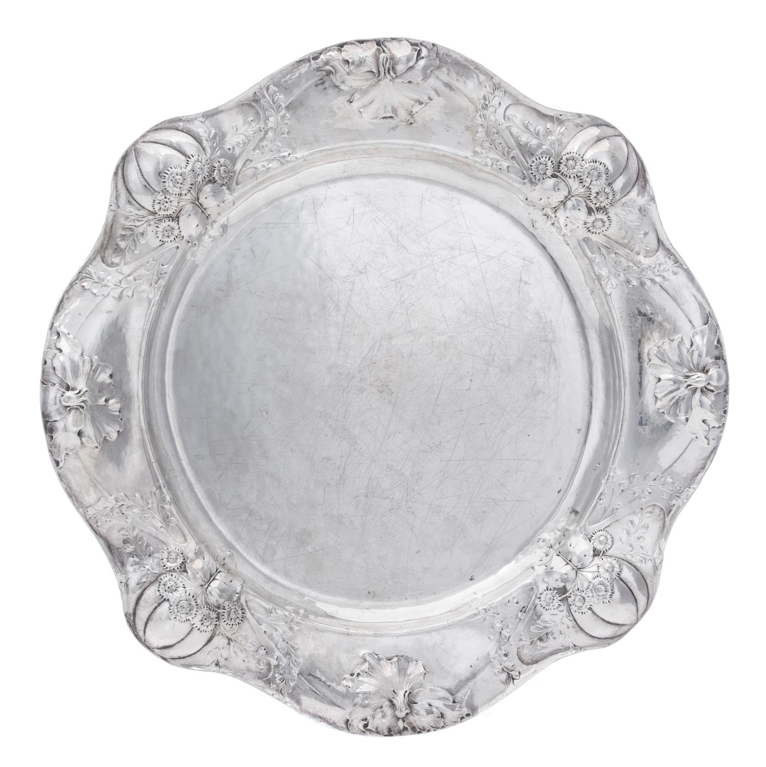 An American Silver Martele Entree Dish, Gorham Mfg. Co., Providence, RI, 1908, shaped circular, the undulating border chased with gourd