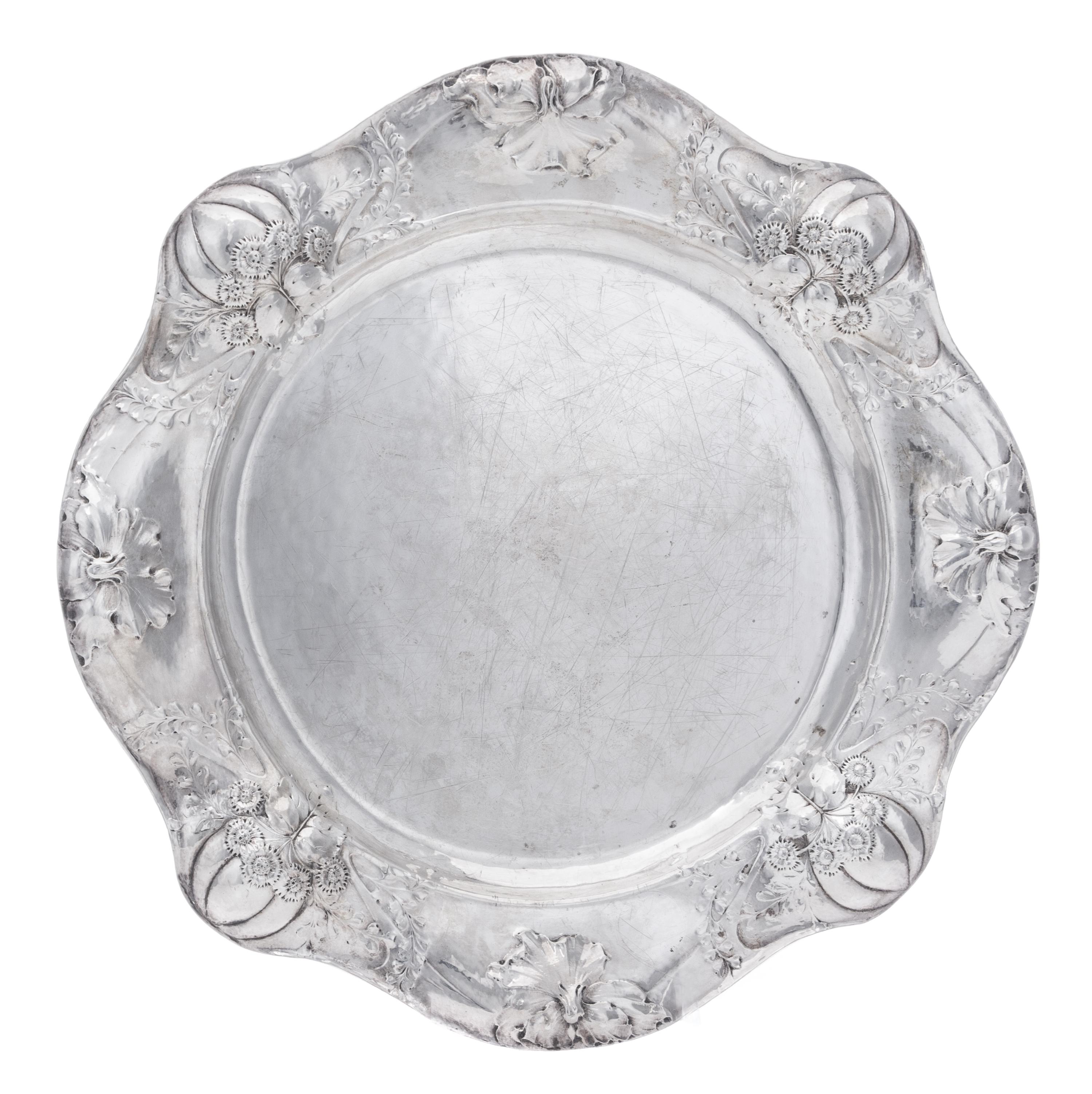 An American Silver Martele Entree Dish, Gorham Mfg. Co., Providence, RI, 1908, shaped circular, the undulating border chased with gourd