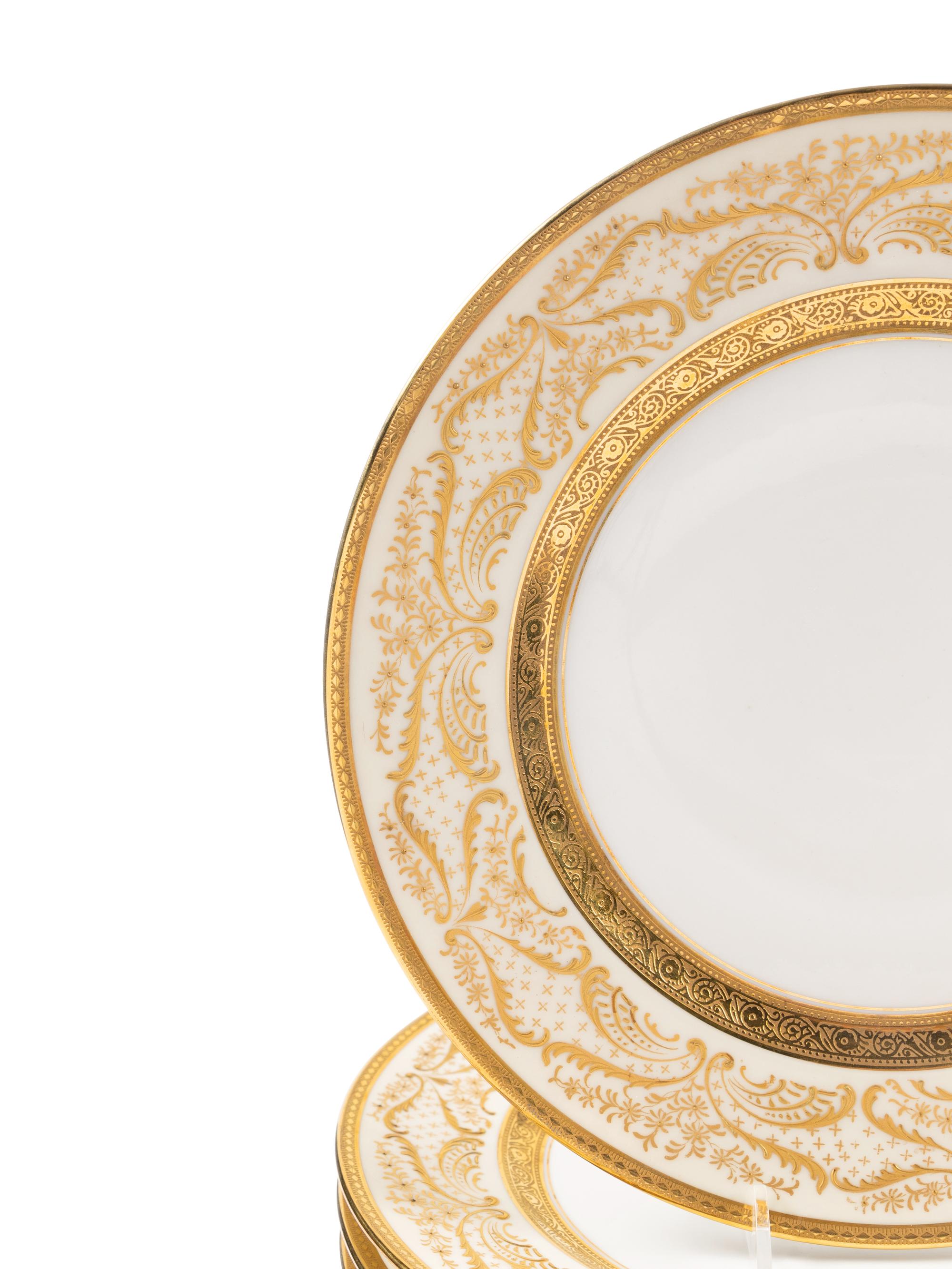 A Set of Thirteen Bernardaud Limoges Porcelain Dinner Plates