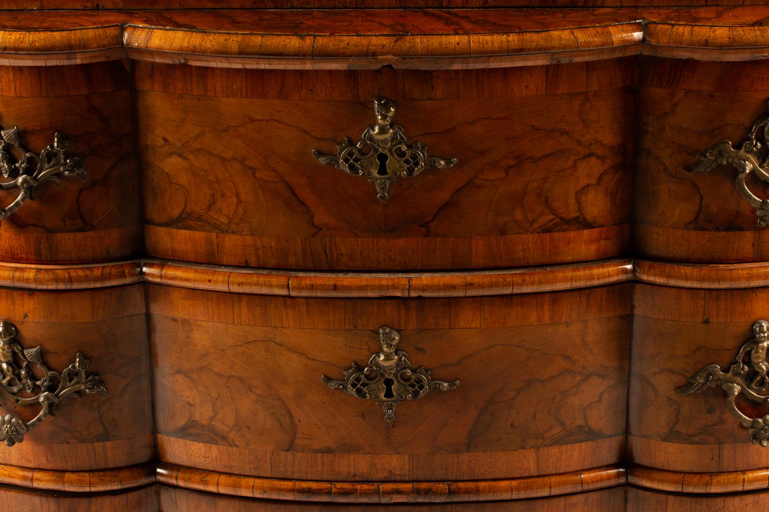 An Austrian Crossbanded Burl Walnut Slant-Front Bureau