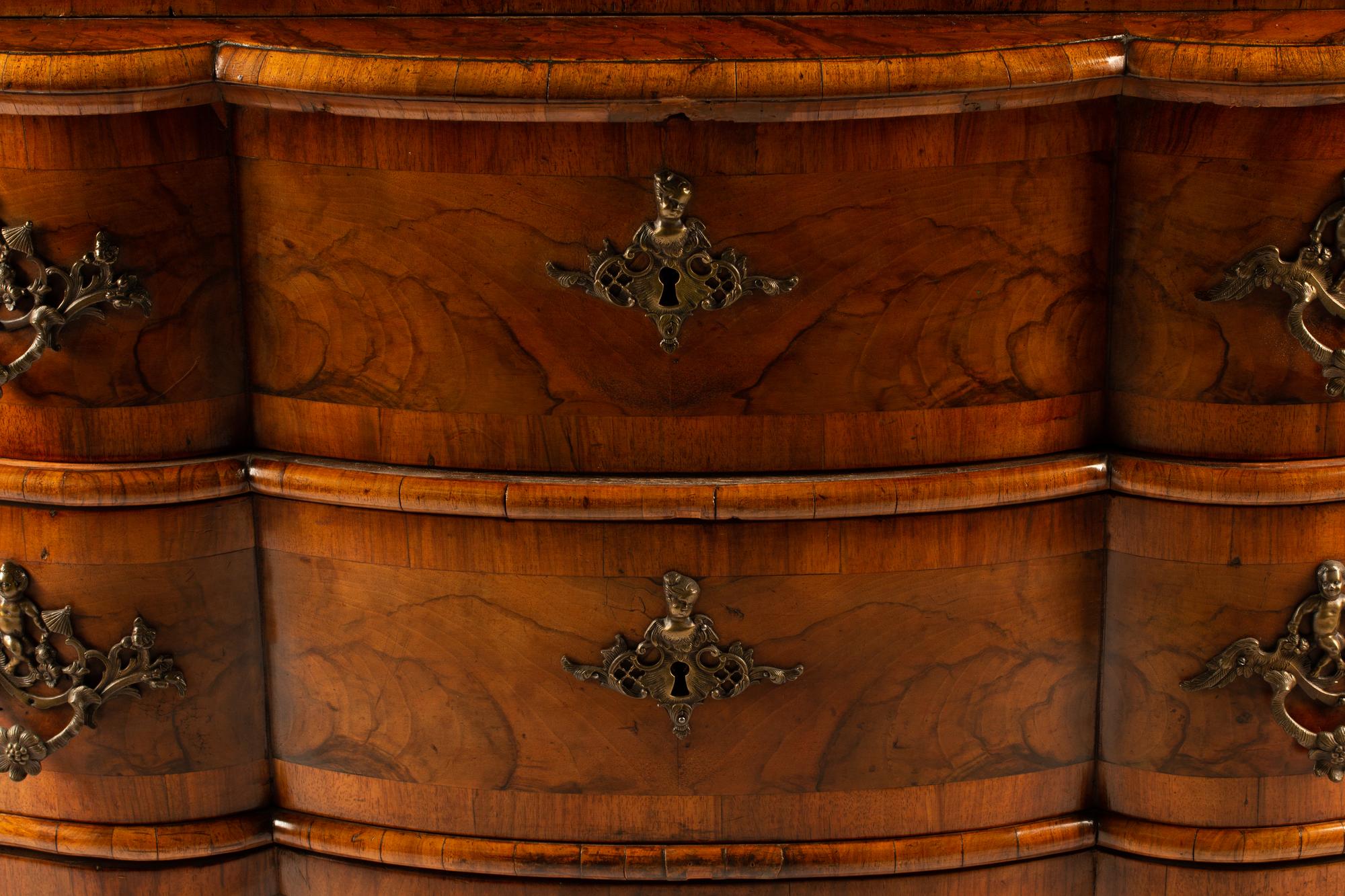 An Austrian Crossbanded Burl Walnut Slant-Front Bureau