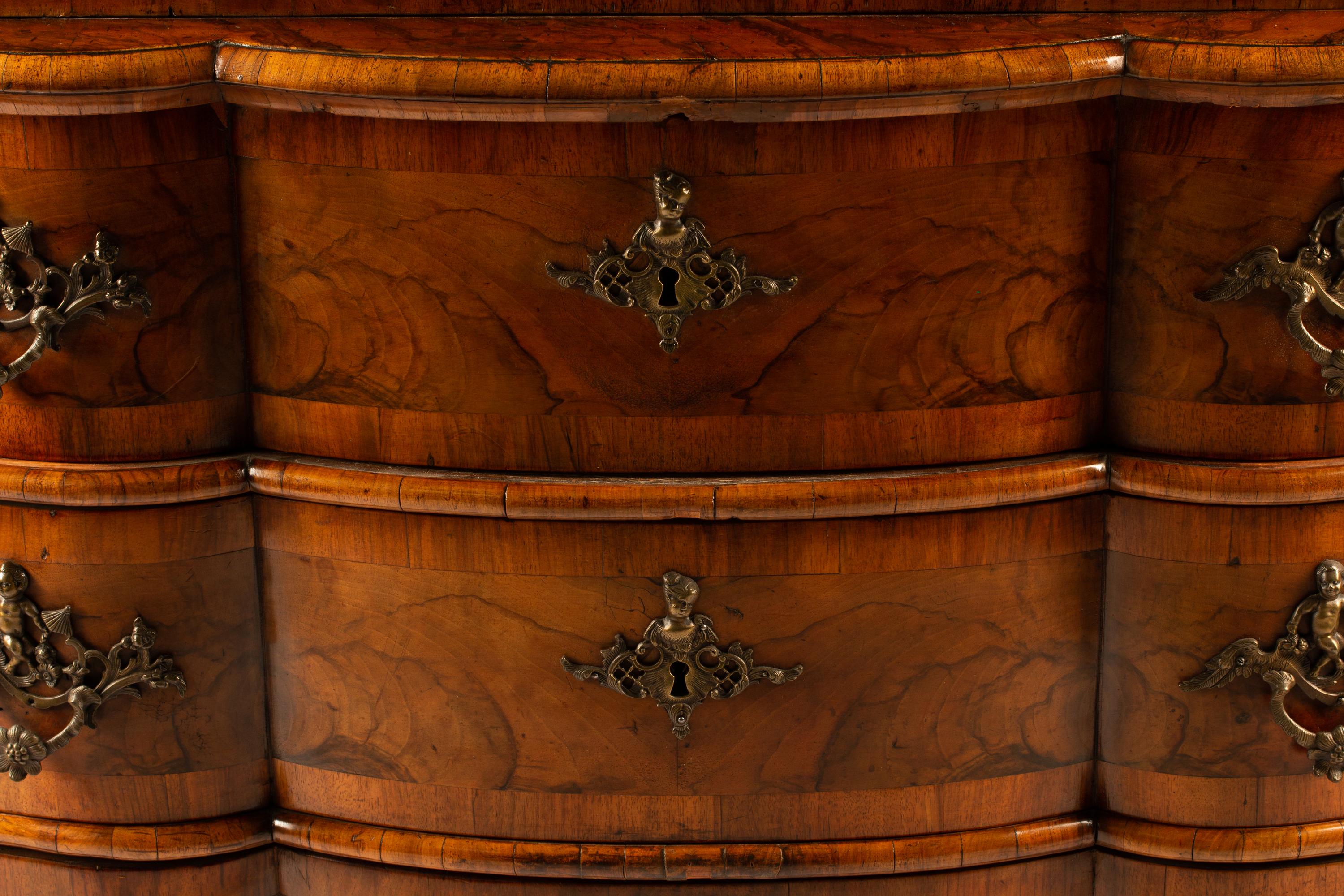 An Austrian Crossbanded Burl Walnut Slant-Front Bureau