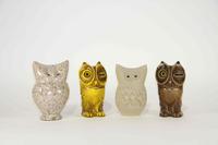 A Group of Four Haeger Pottery Figures Height of tallest 7 3/8 inches.