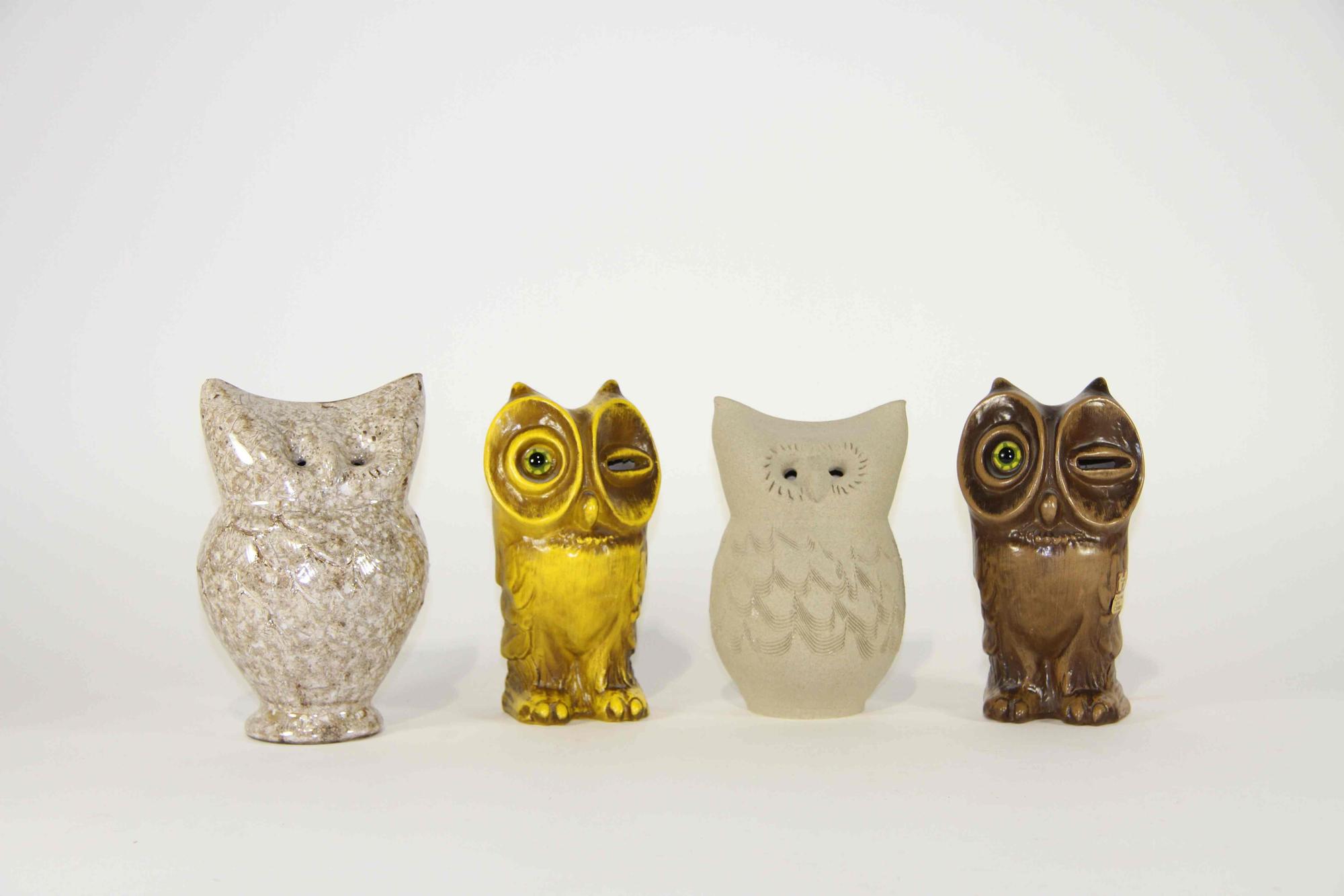 A Group of Four Haeger Pottery Figures Height of tallest 7 3/8 inches.