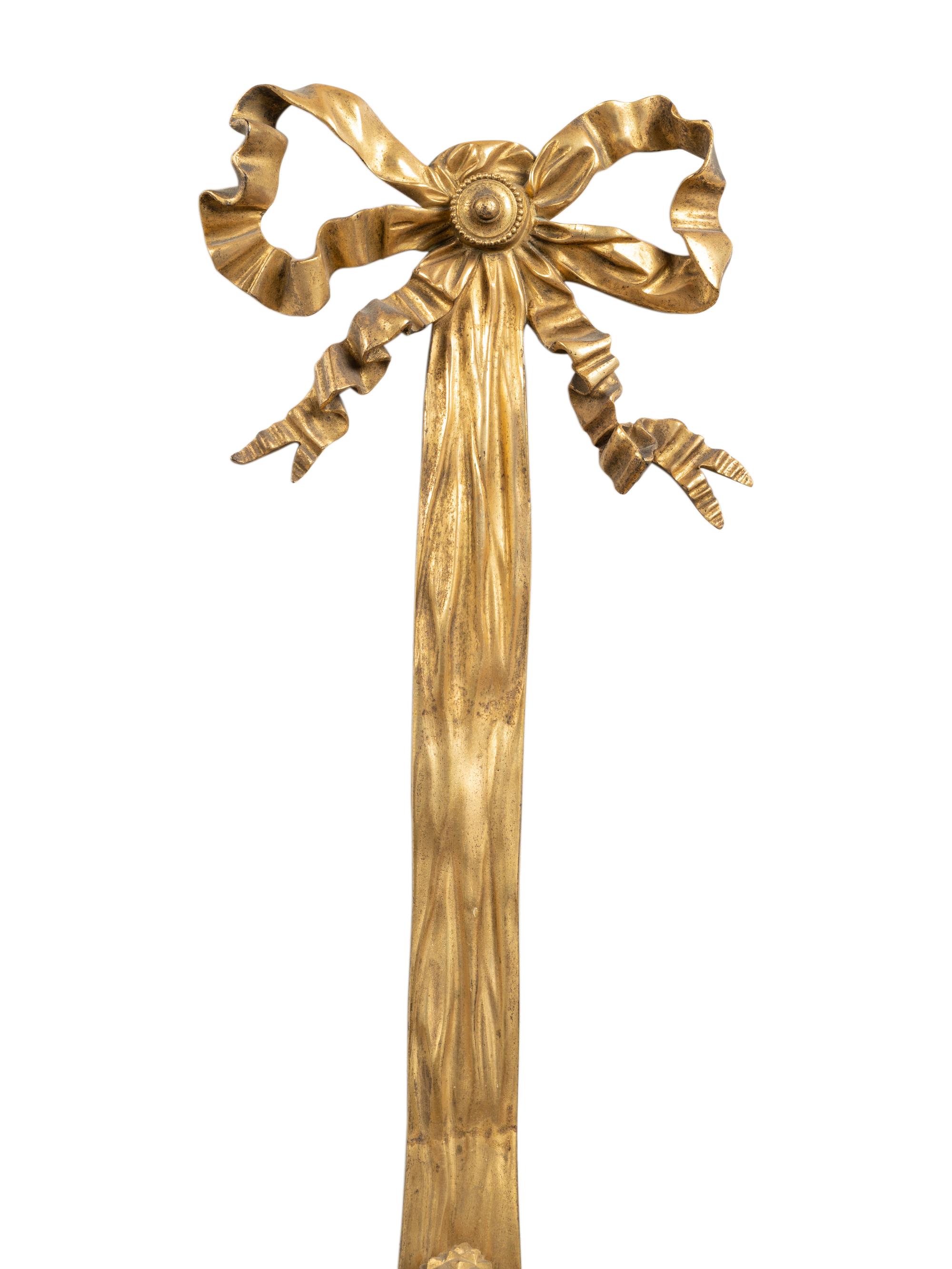 A Pair of Louis XVI Style Gilt Bronze Three-Light Wall Sconces