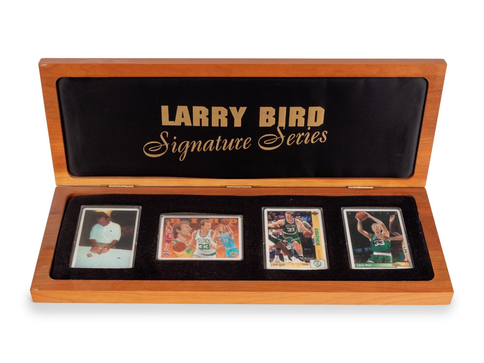 A Larry Bird Signature Series Set of Four Porcelain Basketball Cards