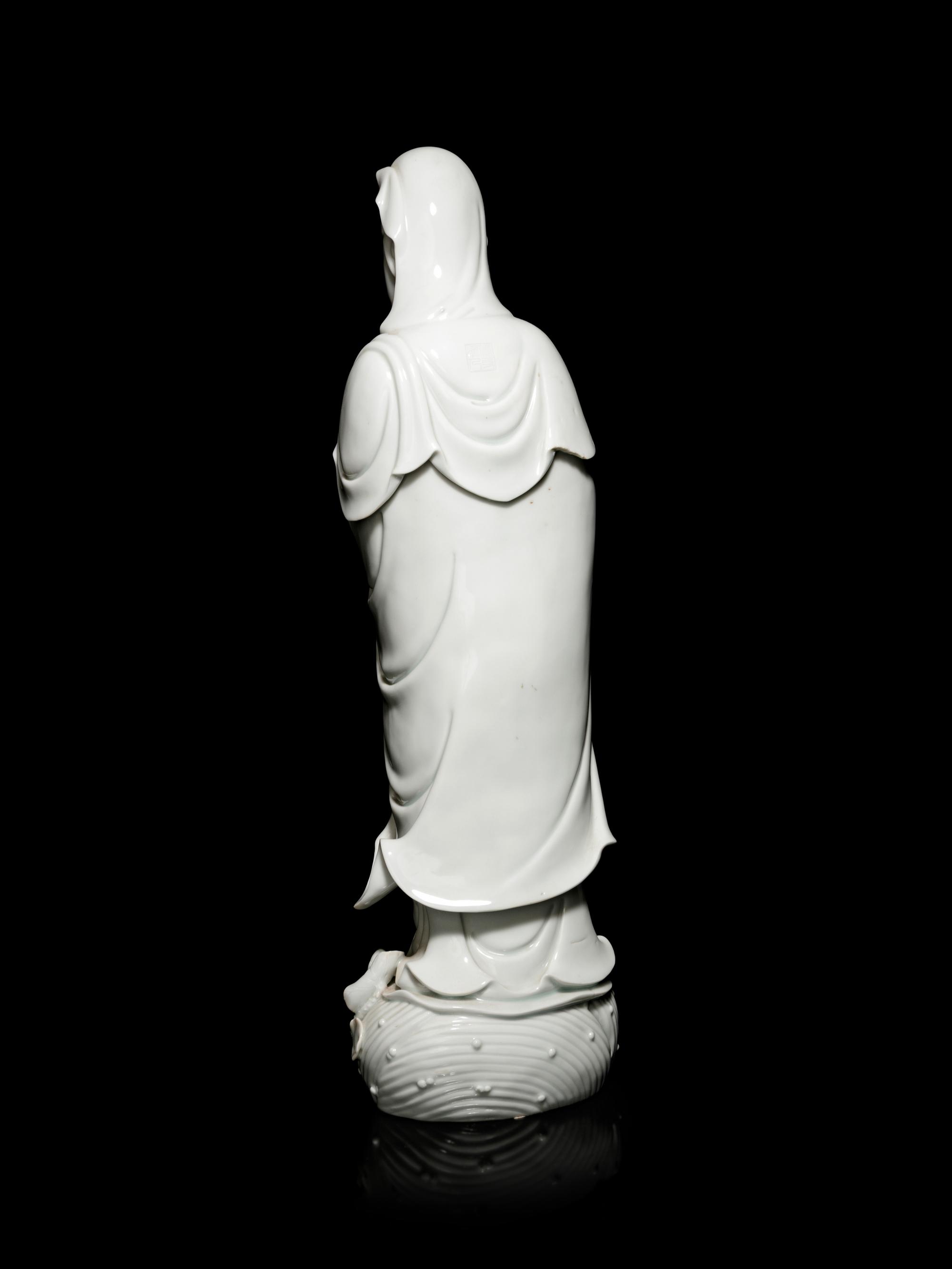 A Large Blanc-de-Chine Porcelain Figure of Guanyin