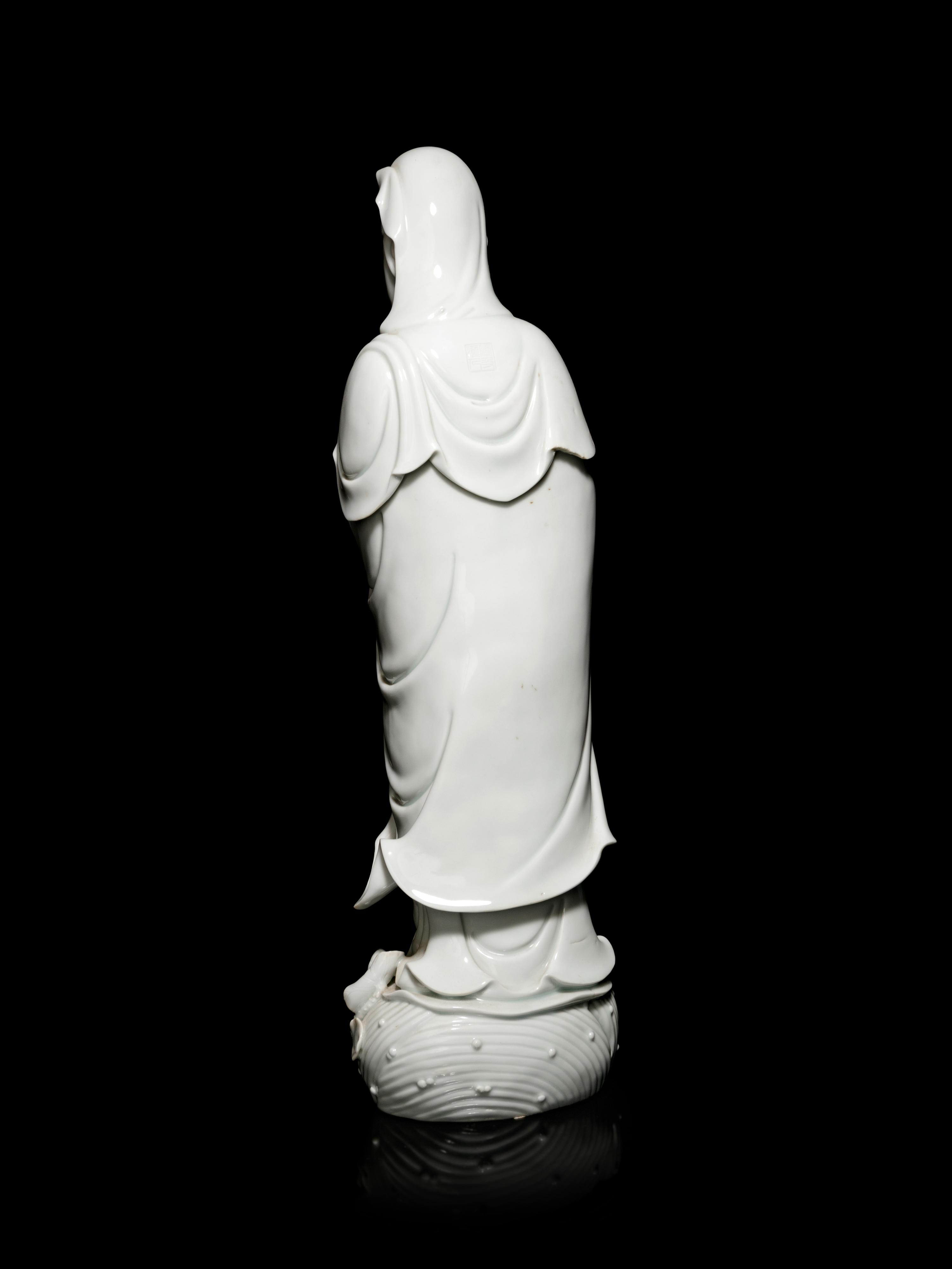 A Large Blanc-de-Chine Porcelain Figure of Guanyin