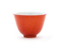 A Red Glazed Porcelain Cup Height 1 3/4 inches.