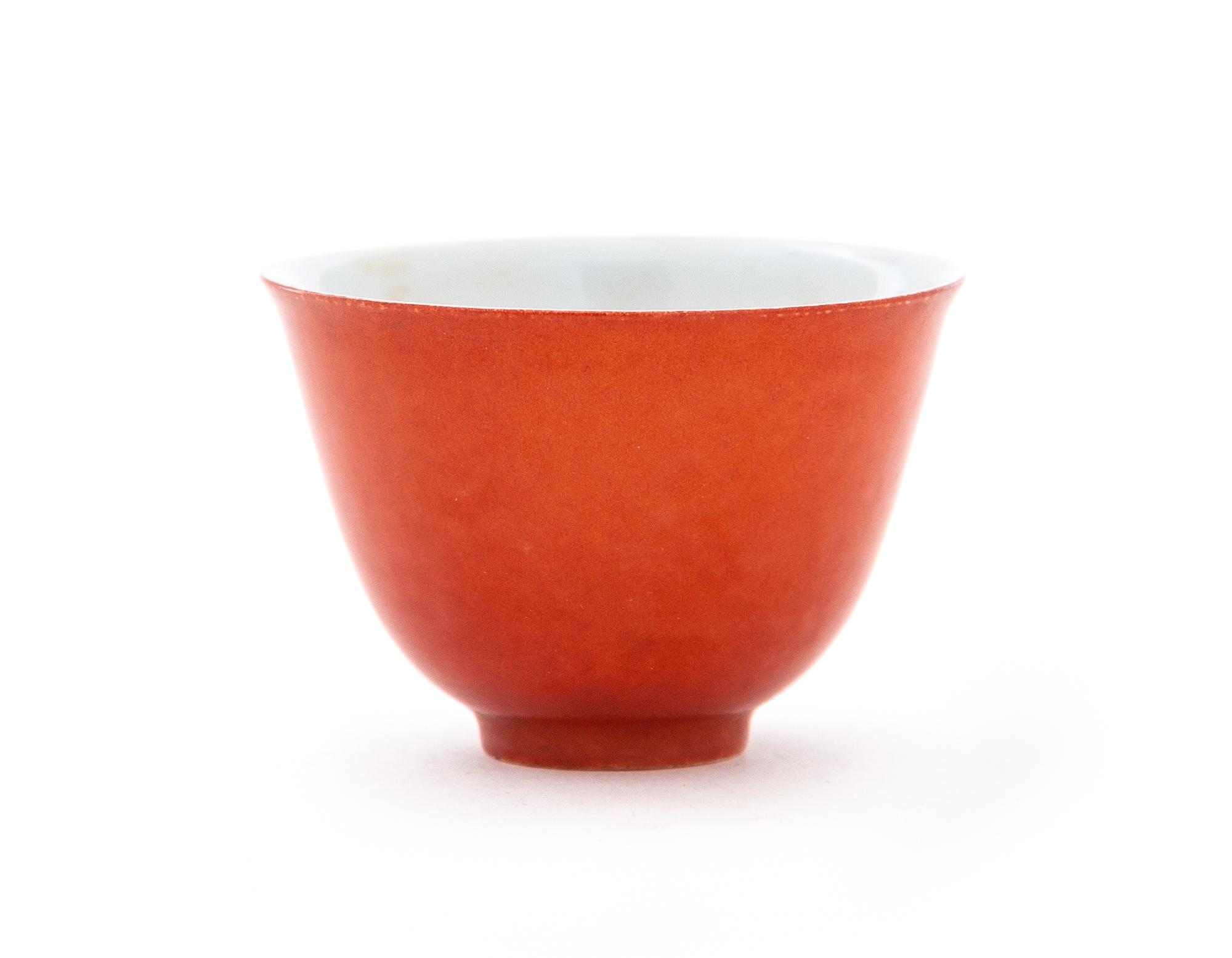 A Red Glazed Porcelain Cup Height 1 3/4 inches.