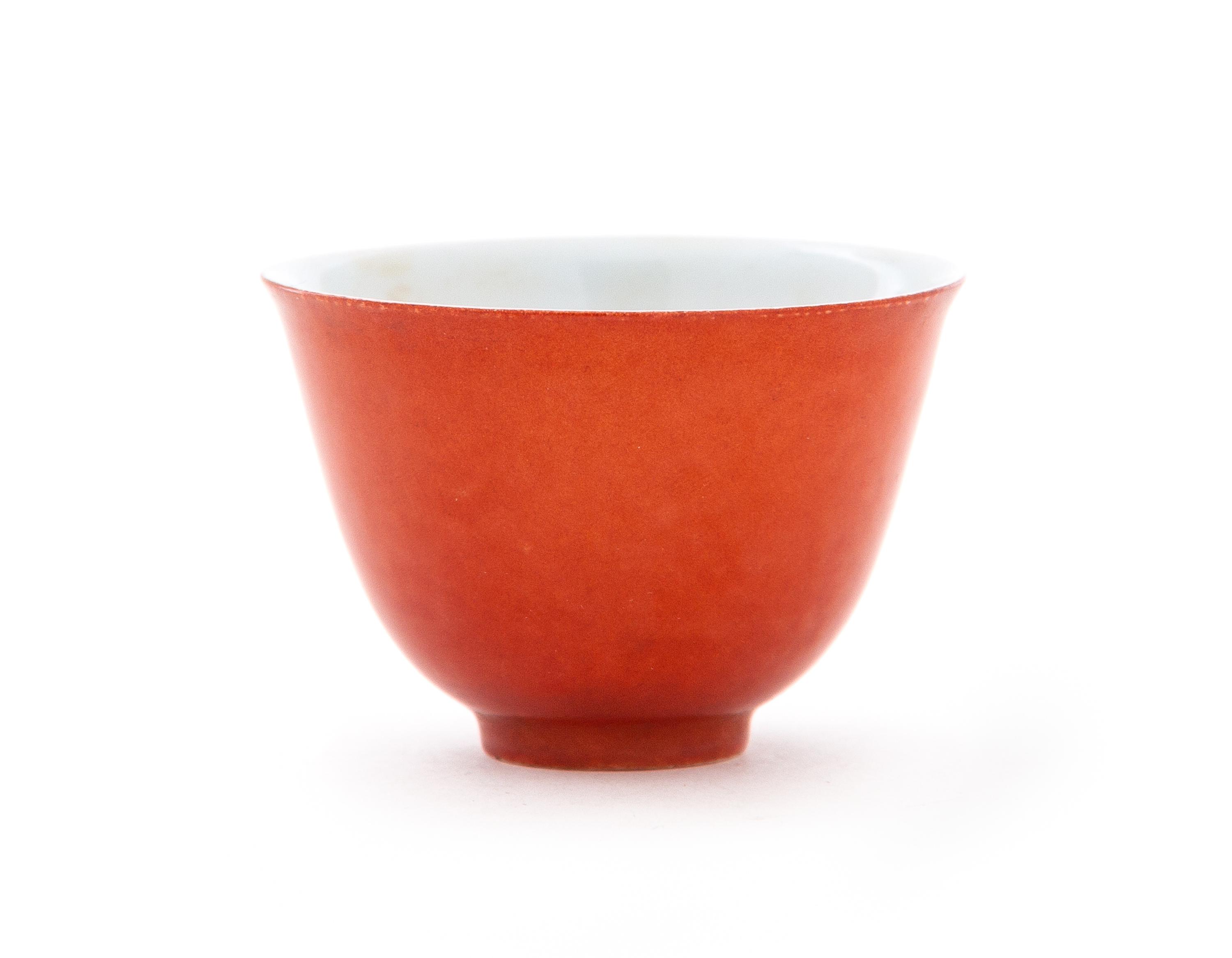 A Red Glazed Porcelain Cup Height 1 3/4 inches.