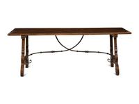 A Spanish Walnut and Wrought Iron Trestle Table