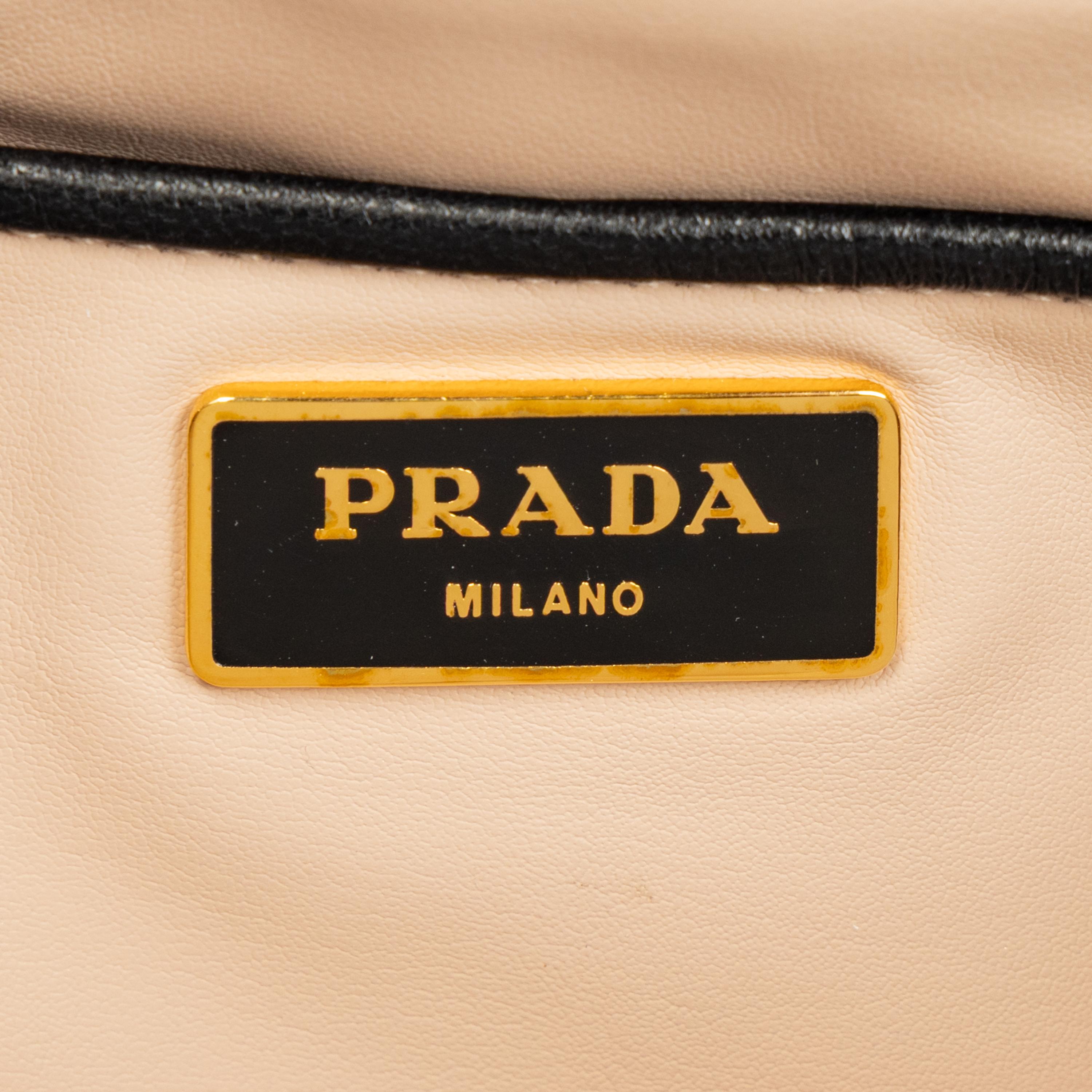 PRADA, SMOKING LIPS LEATHER CLUTCH & WALLET