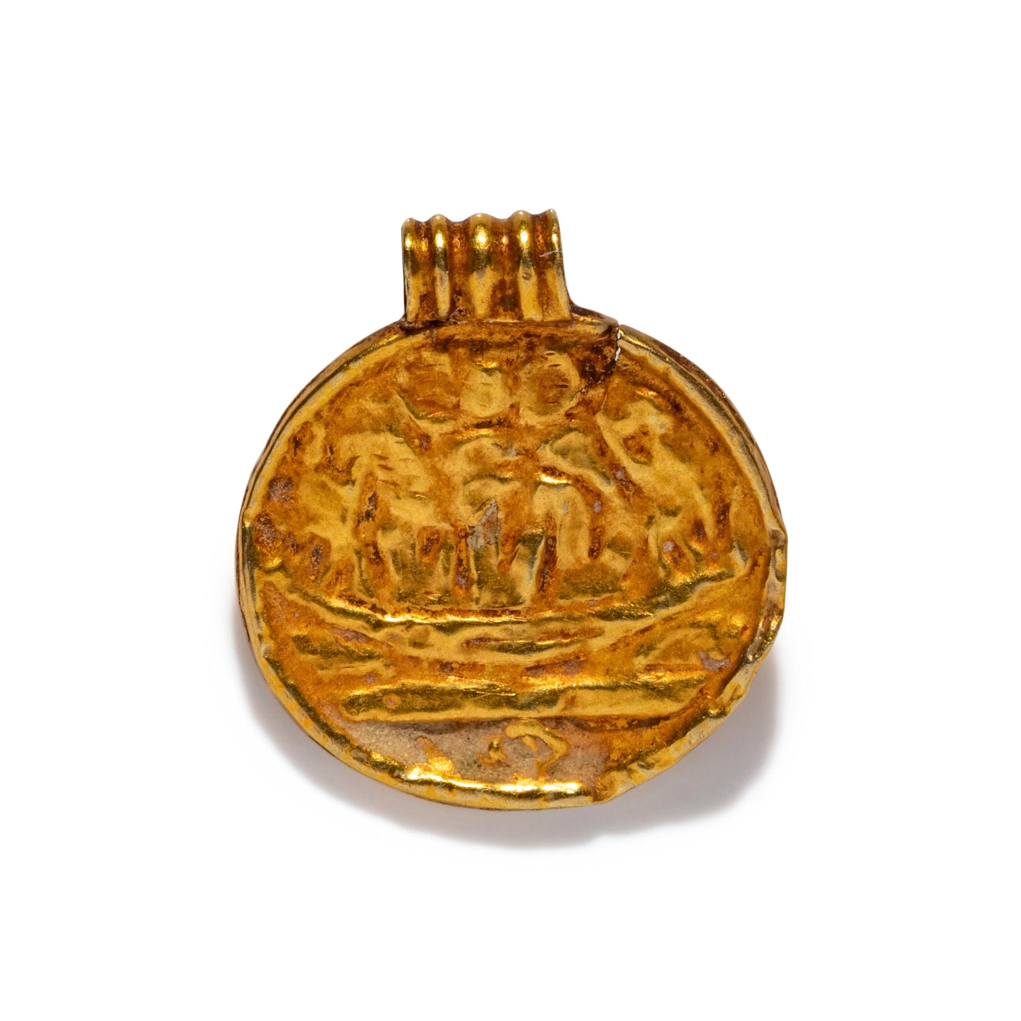 A Phoenician Gold Pendant with a Boat Scene