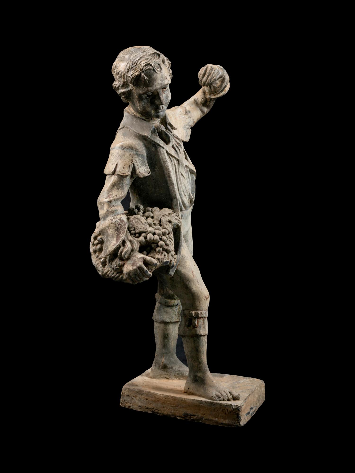 A French Lead Garden Figure of a Boy — 19TH CENTURY