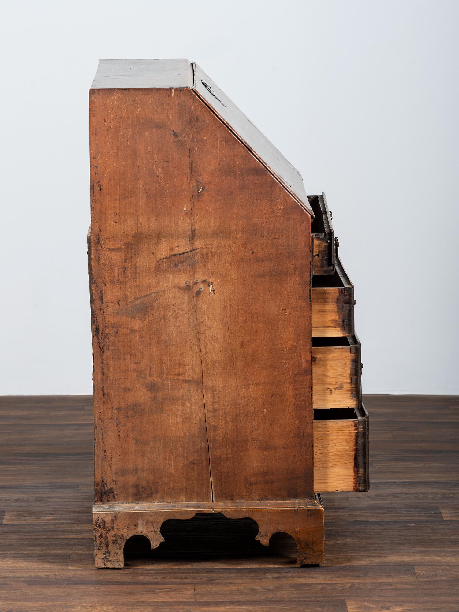 A Chippendale Carved Tiger Maple Slant-Front Desk