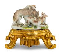 A German Porcelain Hunting Dog and Wolf Group on a Gilt Bronze Stand
