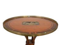 A Continental Neoclassical Style Mahogany Oval Table — 19TH CENTURY