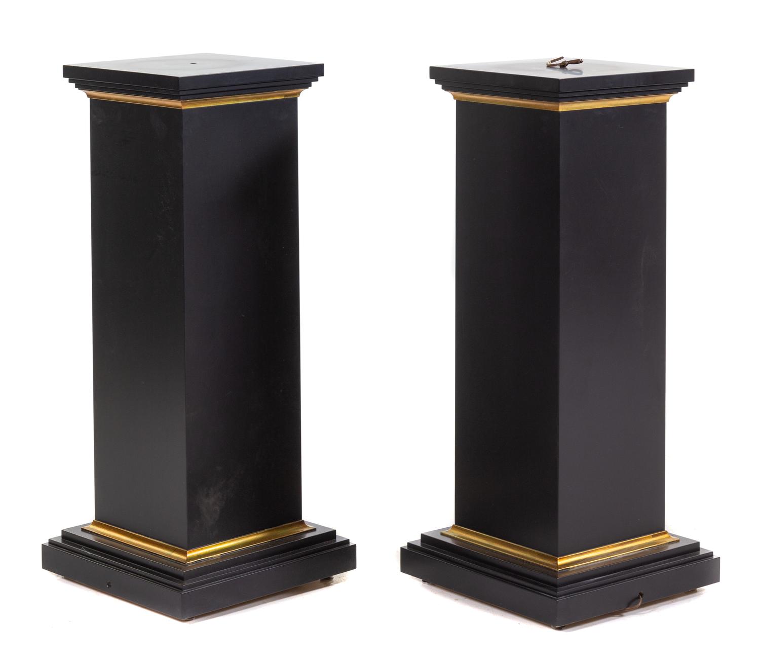 A Pair of Parcel Gilt Ebonized Pedestals Height 40 inches. — 20TH CENTURY