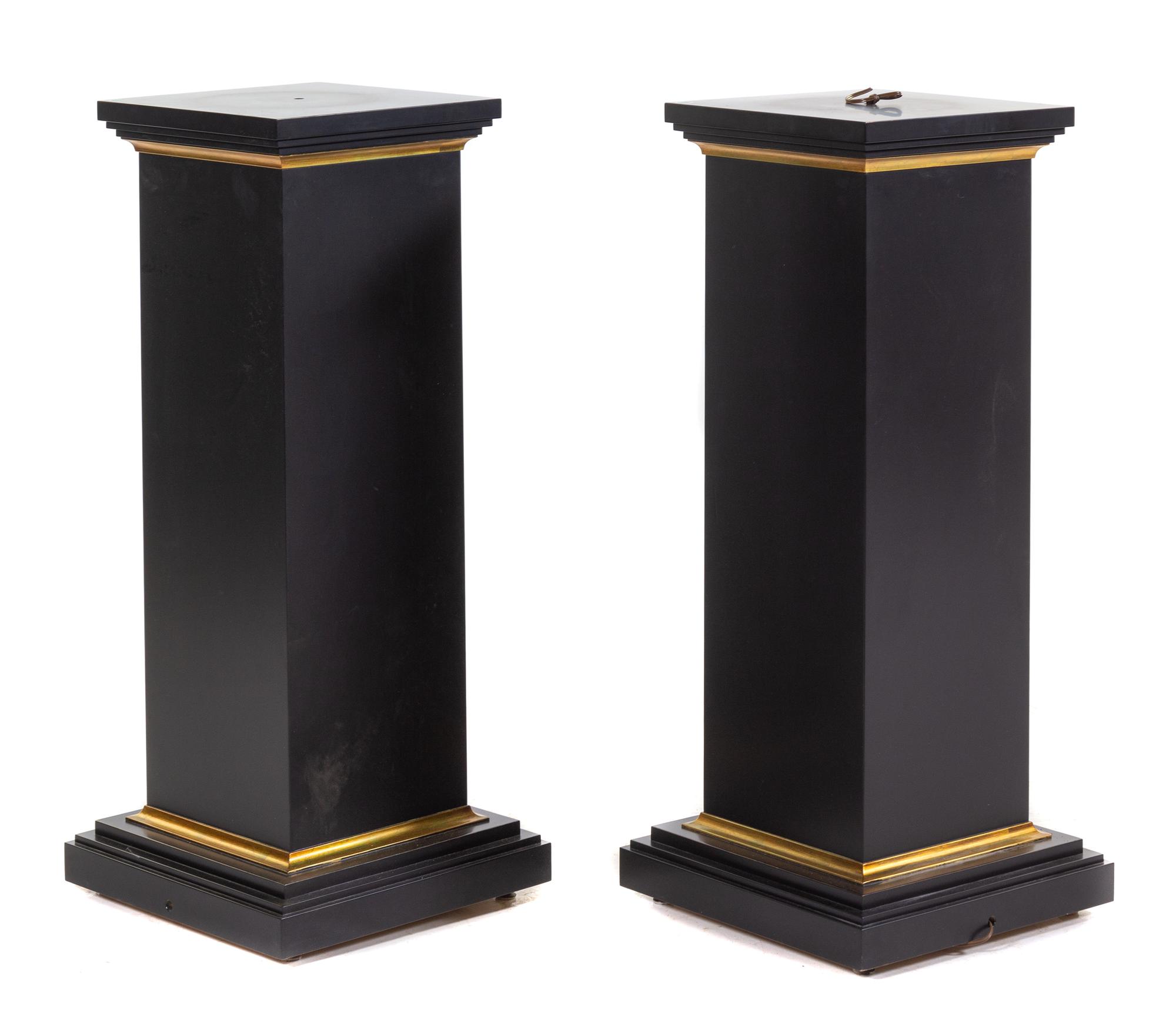 A Pair of Parcel Gilt Ebonized Pedestals Height 40 inches. — 20TH CENTURY