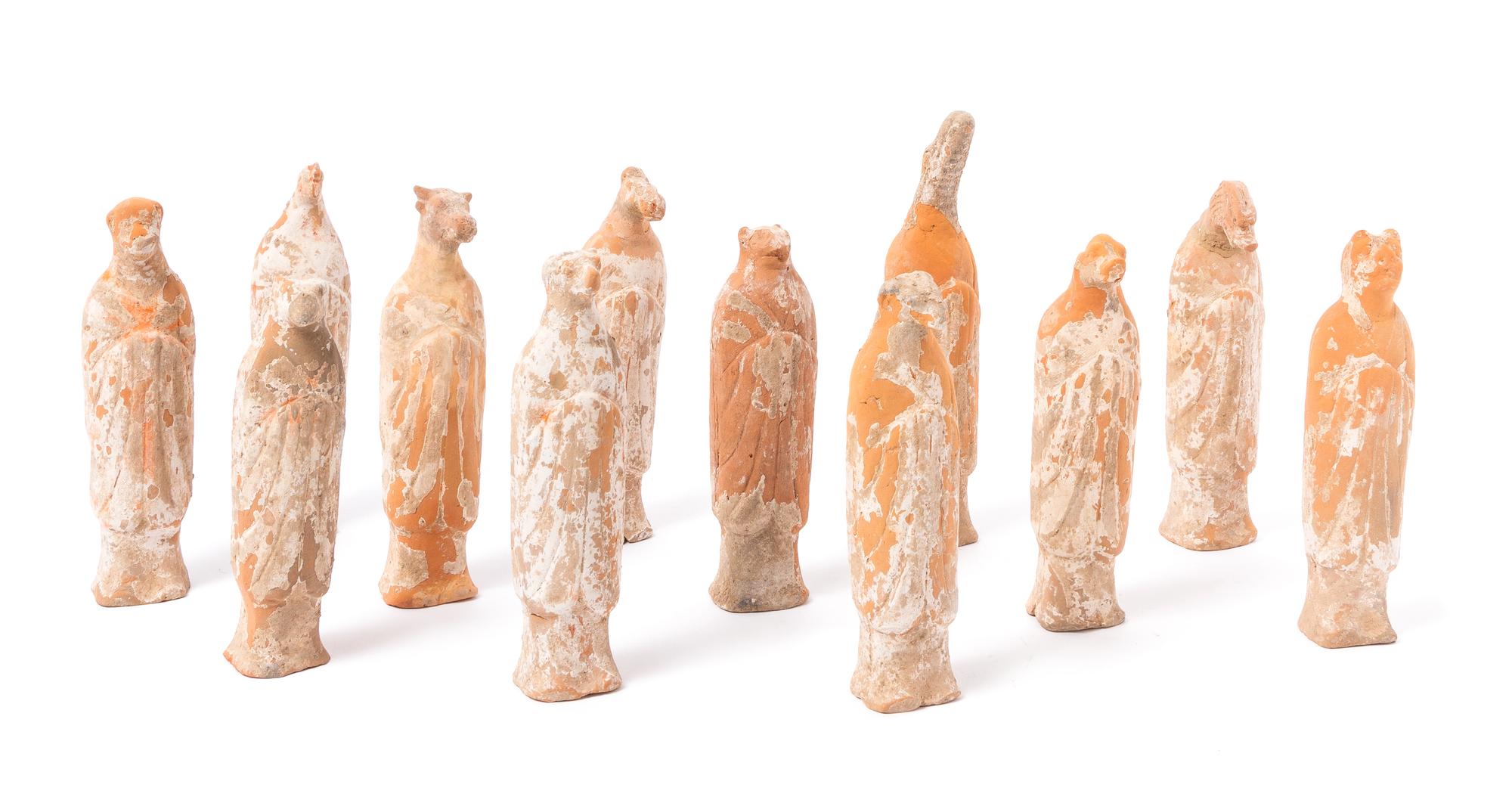 A Set of Twelve Painted Red Pottery Zodiac Figures Height of tallest 8 3/4 inches.