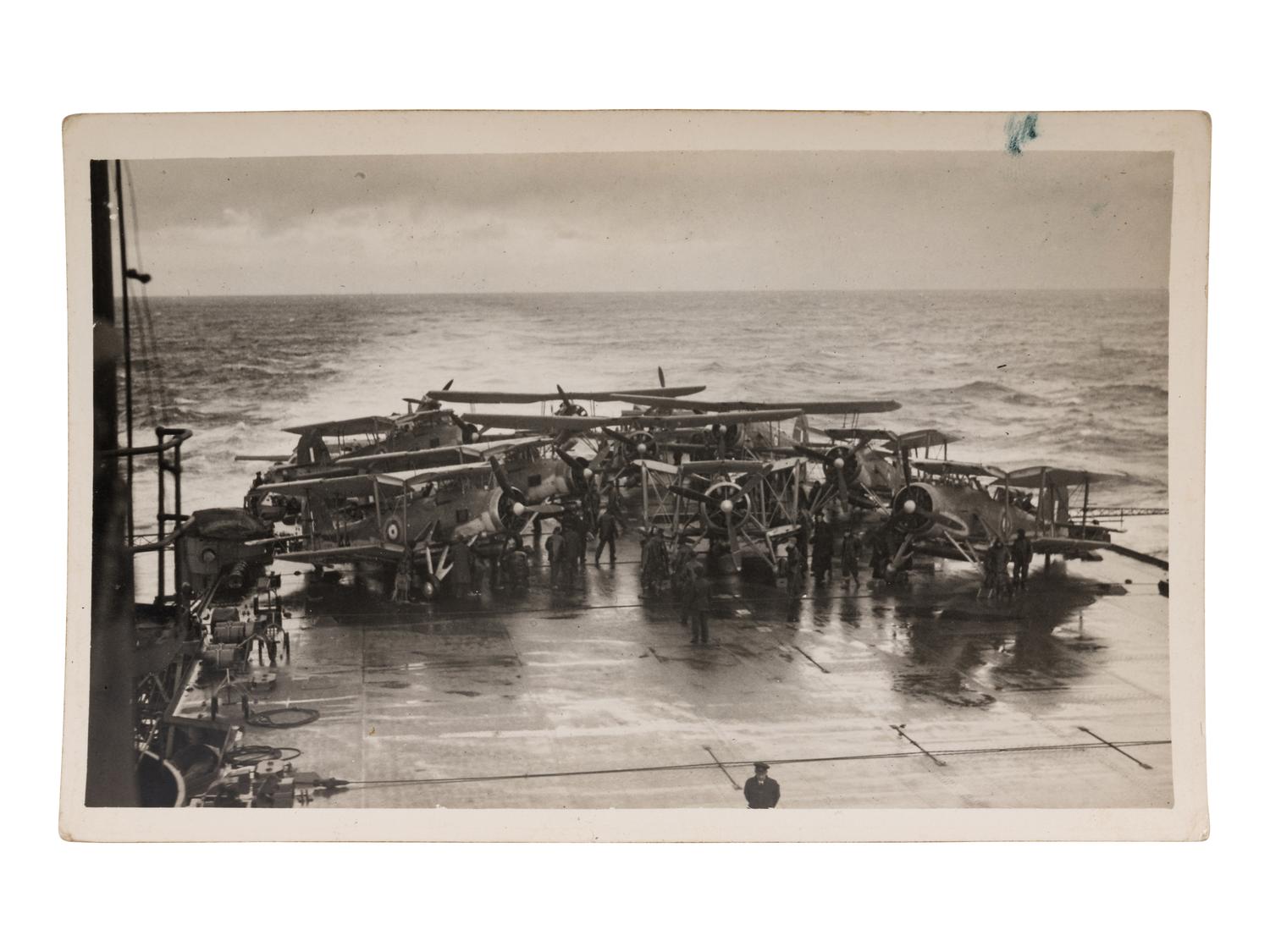 [GERMAN BATTLESHIP BISMARCK]. An archive of photographs and postcards relating to the British hunt for the German battleship Bismarck, ca. 1940s.