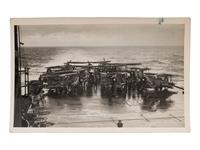 [GERMAN BATTLESHIP BISMARCK]. An archive of photographs and postcards relating to the British hunt for the German battleship Bismarck, ca. 1940s.