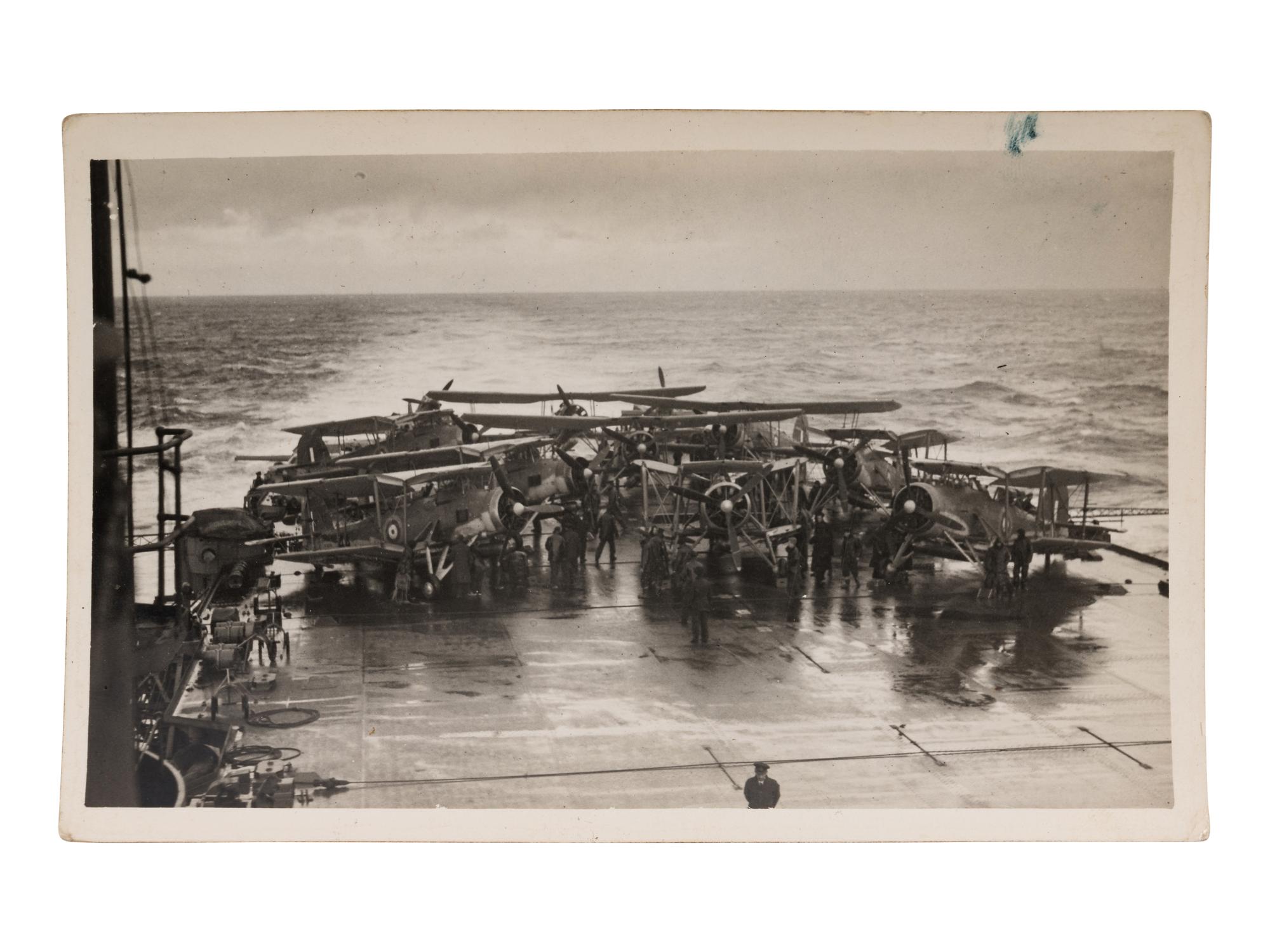 [GERMAN BATTLESHIP BISMARCK]. An archive of photographs and postcards relating to the British hunt for the German battleship Bismarck, ca. 1940s.