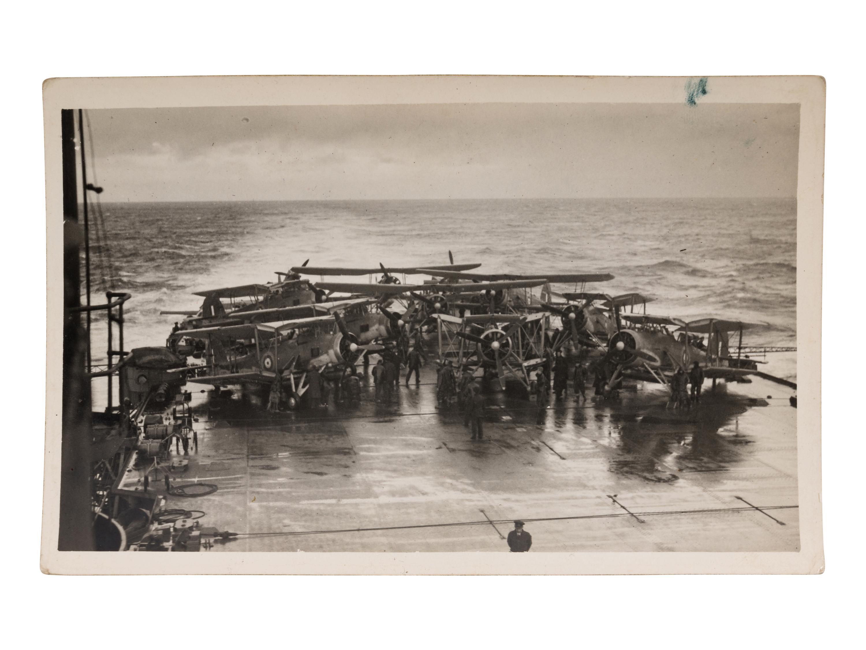 [GERMAN BATTLESHIP BISMARCK]. An archive of photographs and postcards relating to the British hunt for the German battleship Bismarck, ca. 1940s.